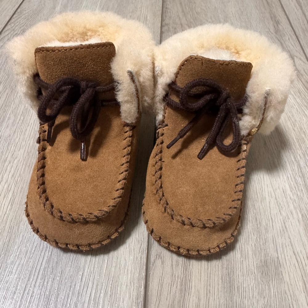 Brand new Ugg baby booties/moccasin size 4/5